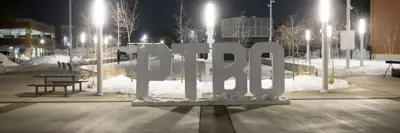 Outdoor skating rink at Quaker Foods City Square and the illuminated PTBO sign