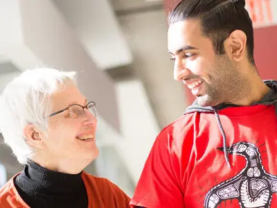 Two people looking at each other