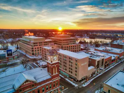 Aerial view of central Peterborough in winter at sunrise, facing east