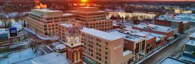 Aerial view of central Peterborough in winter at sunrise, facing east
