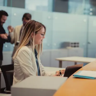 Person provides assistance at customer service desk
