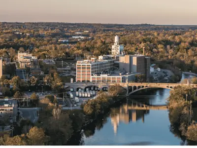 Fall drone photo showing the Quaker PepsiCo Plant in Peterborough with the Hunter Street Bridge in the foreground